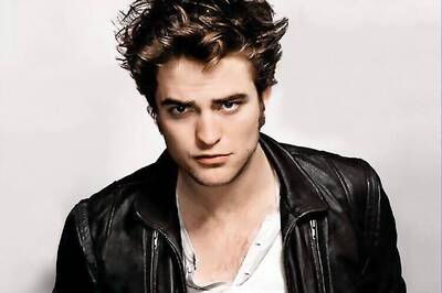 Robert Pattinson hauled by fans to attend an Irish Wedding