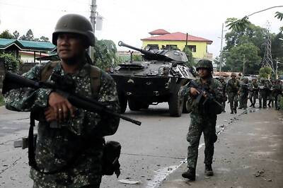 Philippine Forces Pound IS Militants as Civilians Found Shot Dead