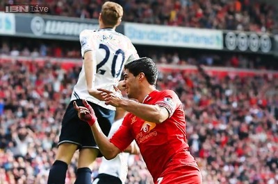 Liverpool crush Spurs 4-0 to go top of Premier League
