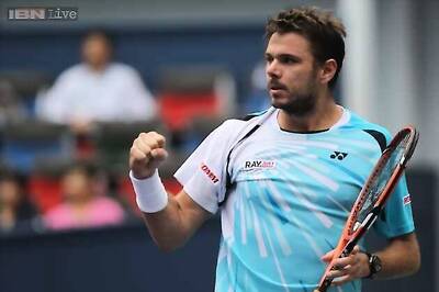 Wawrinka thrashes Berdych to launch London bid