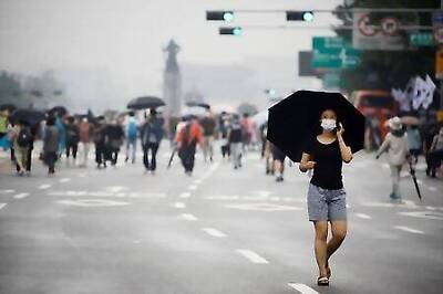 South Korea tightens coronavirus curbs, confines troops to base