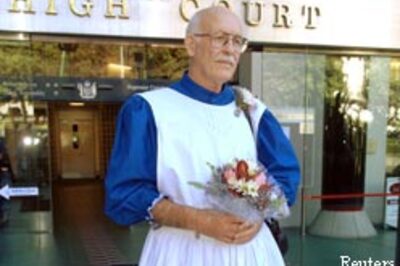 Cross-dressed lawyer hangs up his dress