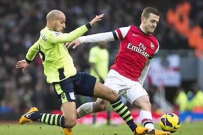 Cazorla gives Arsenal 2-1 victory over Aston Villa