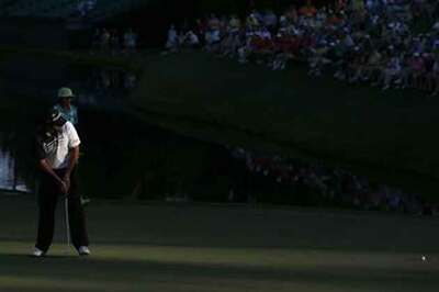  Day seizes one-shot lead, China prodigy makes cut at Augusta