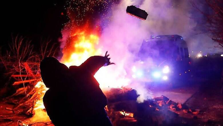 Clashes, Jeers and Burning Tyres Greet Coronavirus Evacuees in Ukraine