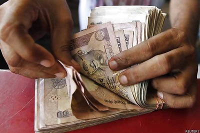 Rupee closes at 1-month high of 60.39 Vs USD; up 13 paise