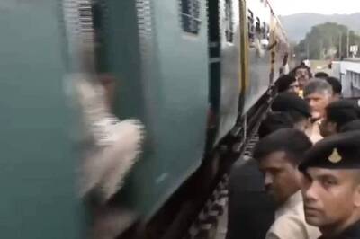 Andhra CM Naidu Unfazed By Speeding Train During Flood Inspection In Vijayawada | Watch