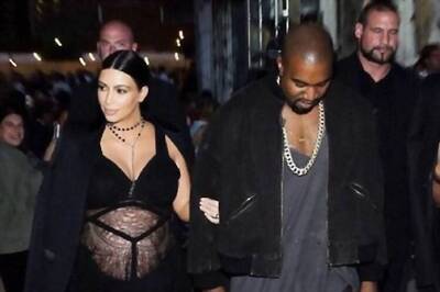 Pregnant Kim Kardashian flaunts baby bump in a lace black dress