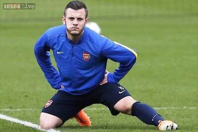 Ramsey out for a month but Wilshere eases Wenger's injury pain