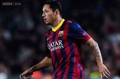 Barcelona's Adriano injured, to miss Ajax match