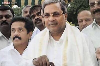 Siddaramaiah inducts 'tainted' D K Shivakumar, R Roshan Baig into Cabinet