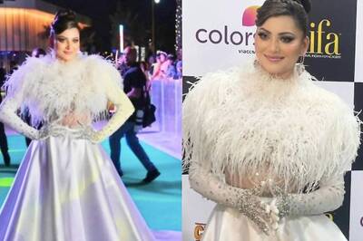 Urvashi Rautela Turns Heads In An All-White, Dramatic Evening Gown With Statement Gloves At IIFA; Watch