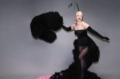 A Look Into Lady Gaga's Dazzling Dramatic Dior Feather Ensemble At Paris Olympics Opening Ceremony