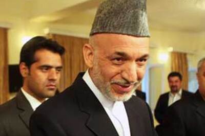 Karzai team claims poll victory, rival snubs them