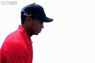 Tiger begins road to Augusta with a limp