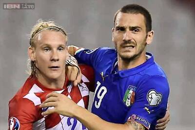 Italy hold Croatia in thriller at empty stadium