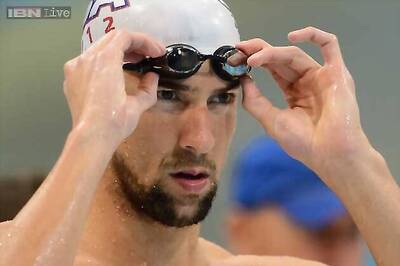 Michael Phelps pipped in 100m butterfly