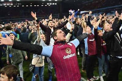 Aston Villa charged following fans' pitch invasion
