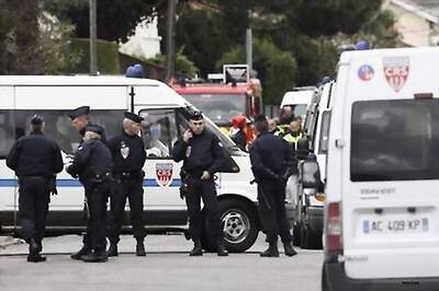 French police seek to wear down besieged gunman