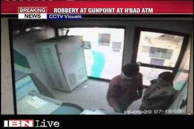 Watch: Woman robbed at gunpoint inside an ATM in Hyderabad