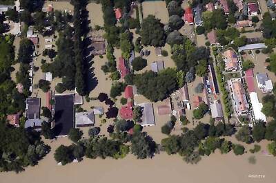 Record floods reach Budapest, Suzuki halts plant