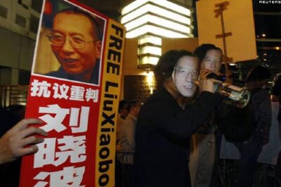 Jailed Nobel winner asks wife to collect prize