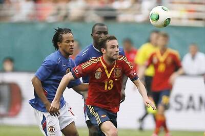 World champions Spain tested by Haiti in a 2-1 win