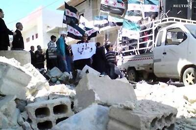 Syria attack kills 21; rebels say protect UN monitors