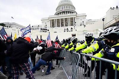 Dozens Charged In Capitol Riots Spewed Extremist Rhetoric