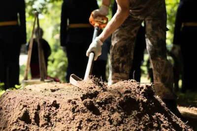 Vietnamese Man Arrested For Digging Up Uncle's Grave To Settle Gambling Debts