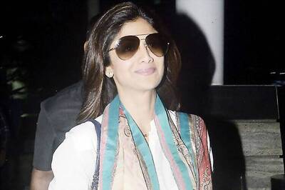 Look of the day: Shilpa Shetty wears a striking white suit as she jets out in style
