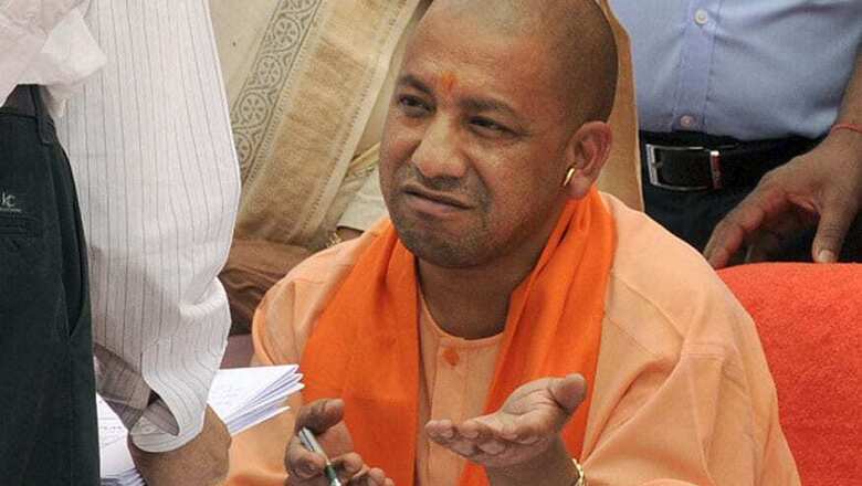 CM Yogi Draws Flak for Refusing to Wear Cap at Kabir Mausoleum