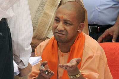 CM Yogi Draws Flak for Refusing to Wear Cap at Kabir Mausoleum