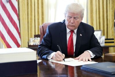 Trump Signs Sweeping Tax Overhaul, Sealing Major Victory