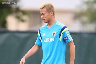 Keisuke Honda carries burden of Japan's World Cup challenge