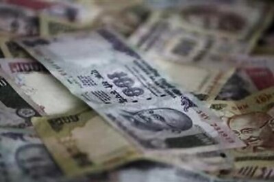Rupee closes in on record lows; RBI fears cap losses
