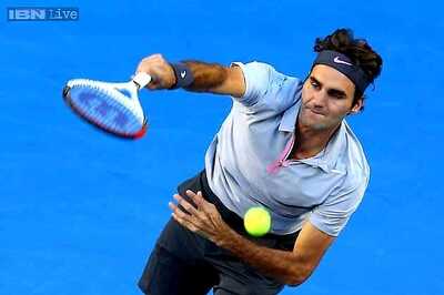 Federer-Zhang win doubles opener at Shanghai Masters