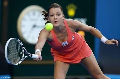 Radwanska wins 13th match in a row, into quarters