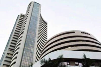 Sensex hits 6-month high to end at 18000