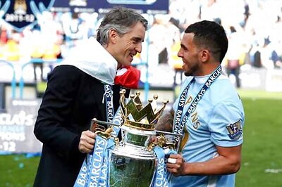 Man City apologise for Tevez 'RIP Fergie' poster