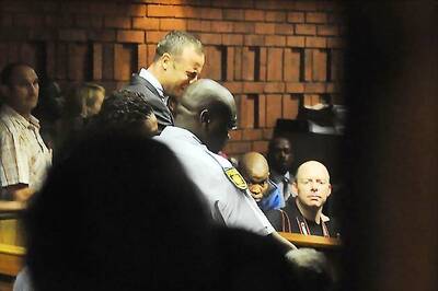 Weeping Pistorius faces premeditated murder charge