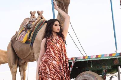 Actress Aradhanaa Ram Is Elegance Personified In Orange-brown Long Sleeveless Skirt