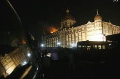 THREE MEN HOLD TAJ TO RANSOM