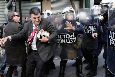 Greece Approves Pension Handout Defying Eurozone Creditors