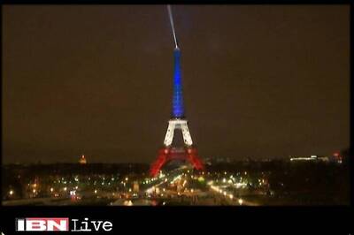 Eiffel Tower lit up in French tricolour to pay tribute to Paris attacks' victims