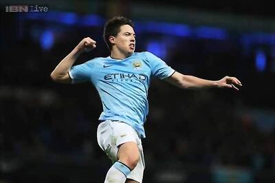 Samir Nasri's brace seals 3-0 victory for Manchester City against Swansea