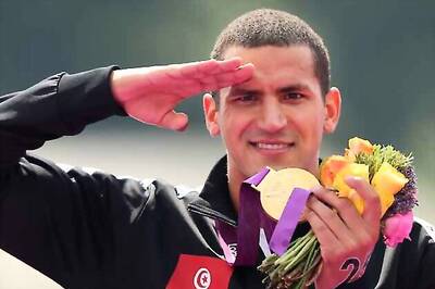 Mellouli wins gold in marathon swimming