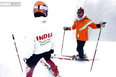 Indian skier ready for flag to fly at closing ceremony