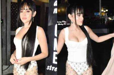Uorfi Javed Makes Jaws Drop As She Steps Out for Dinner In White Swimsuit And Chain Mail; Watch Video