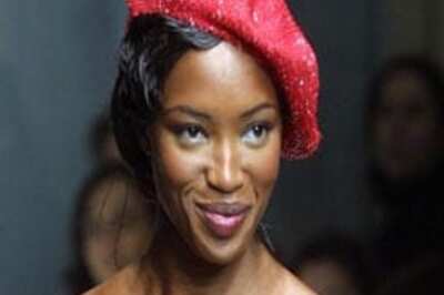 Naomi starts sentence, mops floors